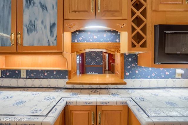 kitchen with tile countertops