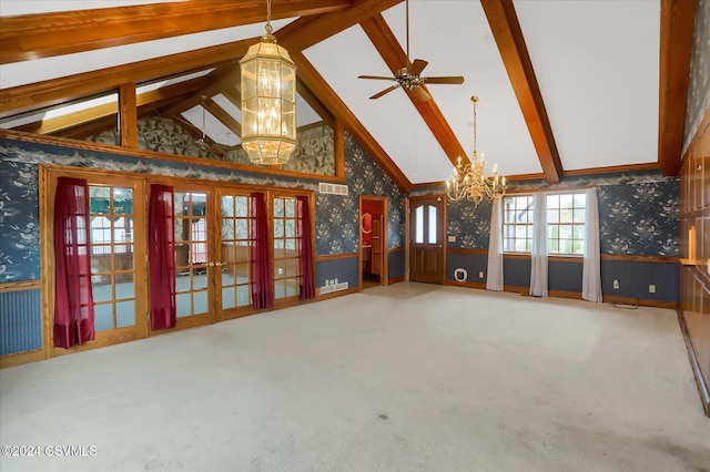 unfurnished living room with carpet floors, beamed ceiling, ceiling fan with notable chandelier, and high vaulted ceiling