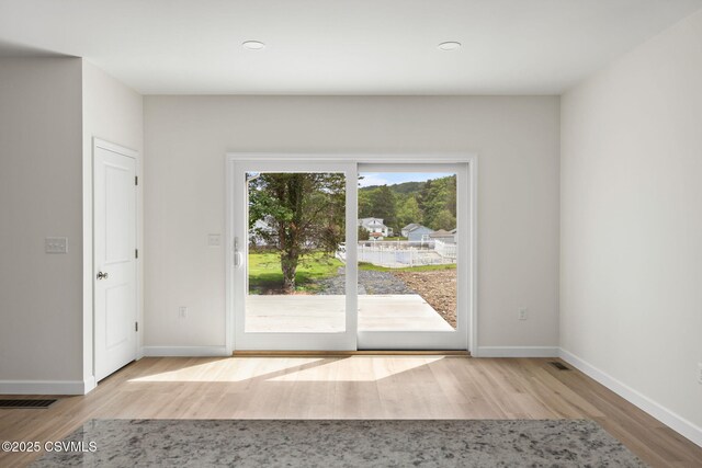 151 Hillside Ave, Elysburg, PA 17824 - unfurnished room with wood finished floors, baseboards, and recessed lighting