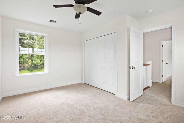 151 Hillside Ave, Elysburg, PA 17824 - unfurnished bedroom with light colored carpet, baseboards, and a closet