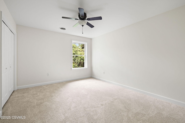151 Hillside Ave, Elysburg, PA 17824 - unfurnished bedroom with baseboards, carpet floors, a closet, and a ceiling fan