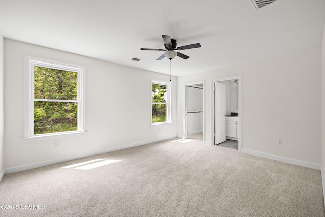 151 Hillside Ave, Elysburg, PA 17824 - unfurnished bedroom featuring carpet flooring, multiple windows, baseboards, and ensuite bath