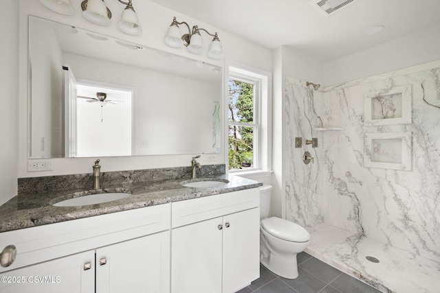 151 Hillside Ave, Elysburg, PA 17824 - full bathroom with double vanity, a marble finish shower, toilet, and tile patterned flooring