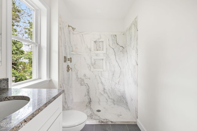 151 Hillside Ave, Elysburg, PA 17824 - full bathroom with vanity, toilet, a marble finish shower, and tile patterned flooring