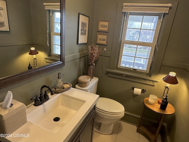 bathroom featuring tile patterned floors, decorative backsplash, toilet, and vanity