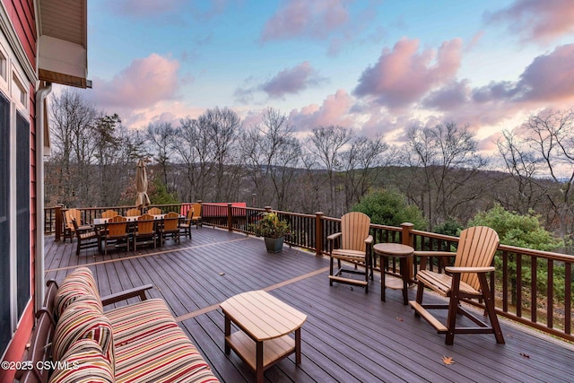 deck featuring outdoor dining area