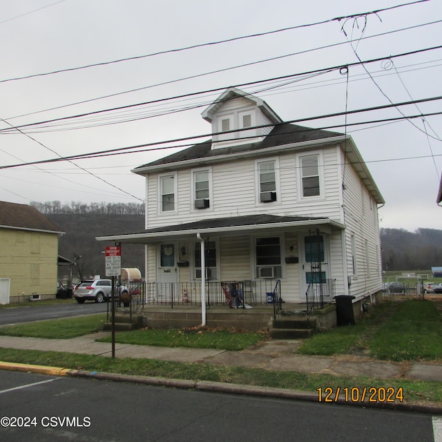 view of front of house with covered porch