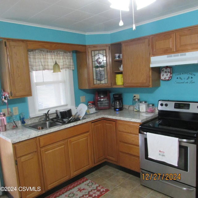 kitchen with crown molding, sink, stainless steel range with electric cooktop, and light stone countertops