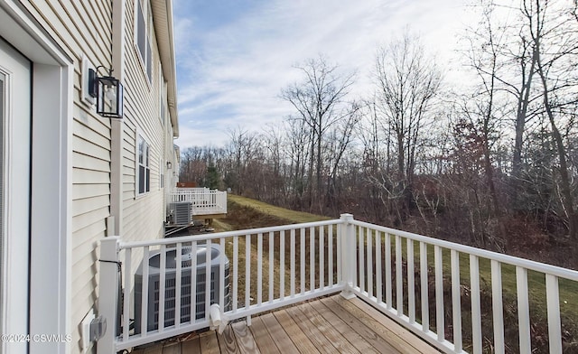 wooden terrace with central air condition unit