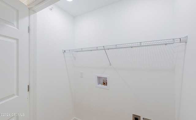 laundry room with hookup for an electric dryer and hookup for a washing machine