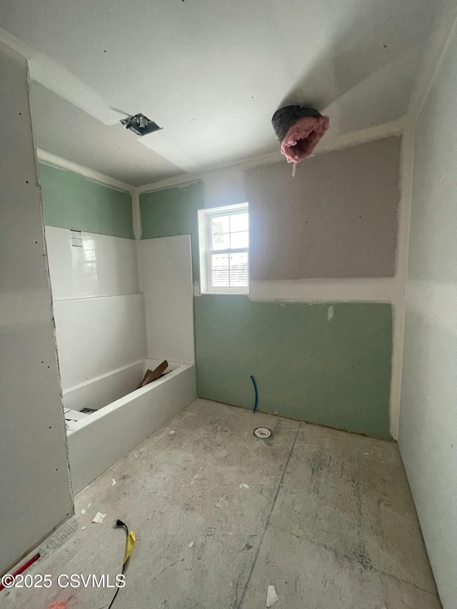 bathroom featuring a tub