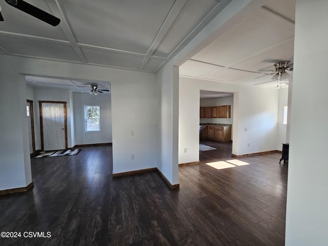 spare room with dark hardwood / wood-style floors and ceiling fan