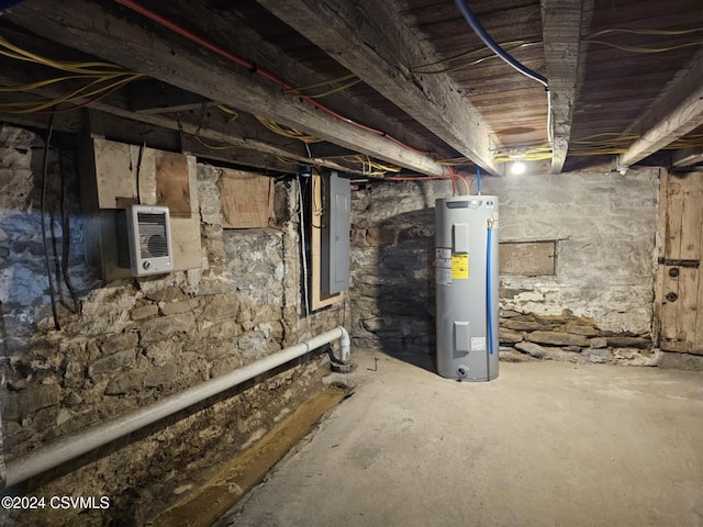 basement with electric water heater and electric panel