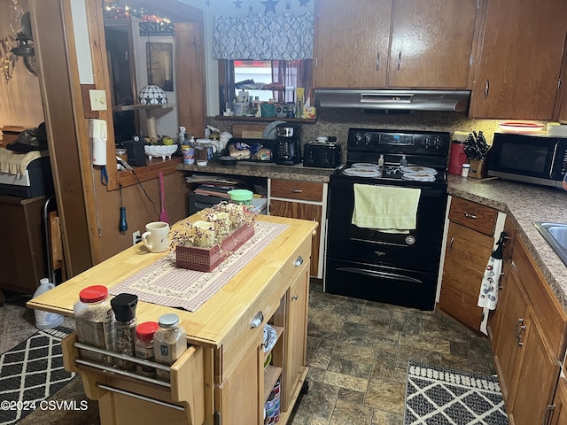 kitchen with black range with electric stovetop