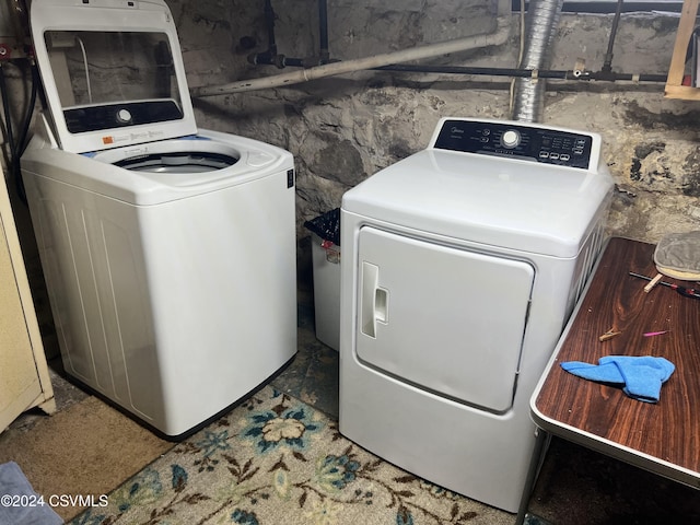 laundry area featuring washer and clothes dryer