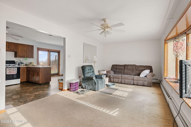 living room featuring a baseboard radiator and ceiling fan