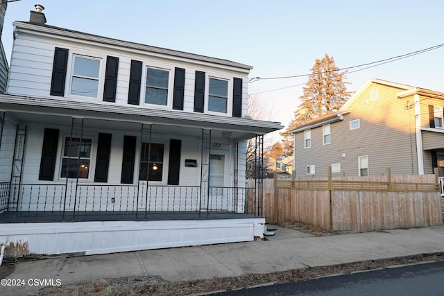 view of front of property featuring covered porch