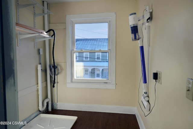 bathroom with hardwood / wood-style flooring