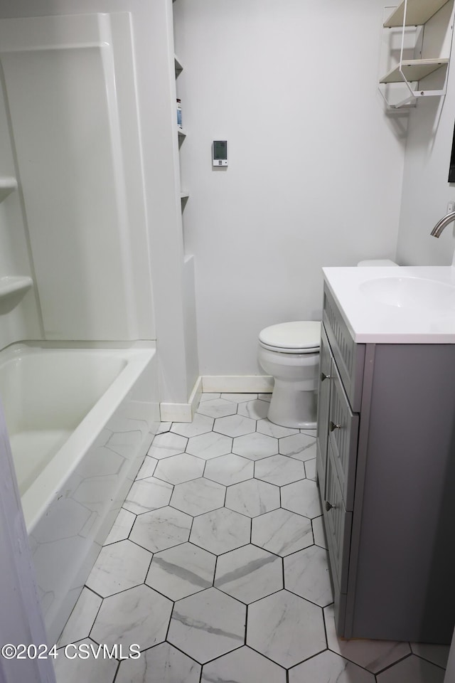 full bathroom featuring tile patterned flooring, vanity, toilet, and tub / shower combination