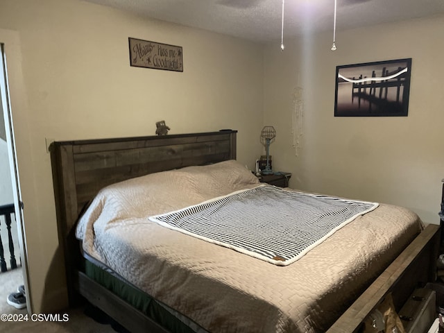 bedroom with a textured ceiling