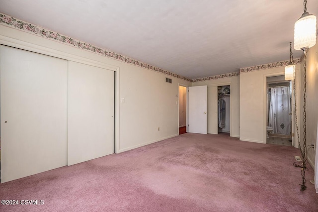 unfurnished bedroom featuring carpet floors