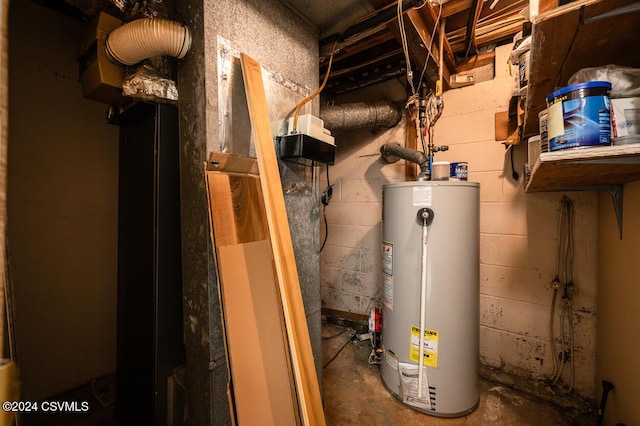 utility room with gas water heater