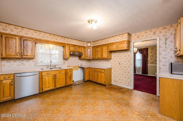 kitchen with sink and appliances with stainless steel finishes