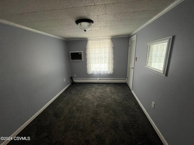 spare room with a wall unit AC, crown molding, dark carpet, and a baseboard heating unit