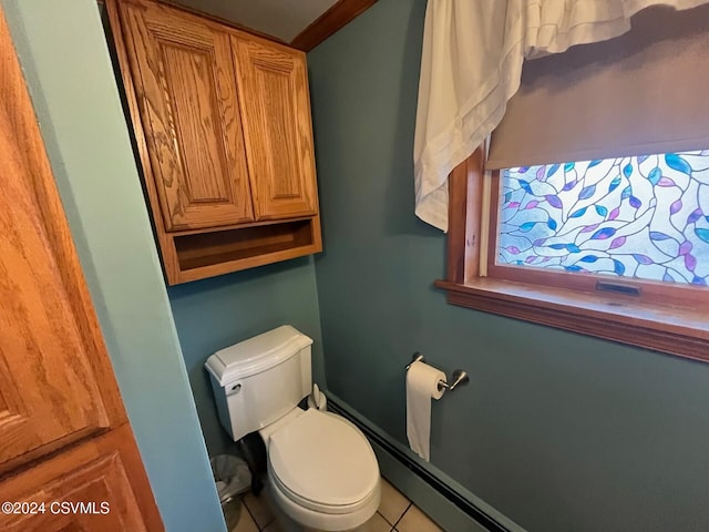 bathroom with tile patterned flooring and toilet