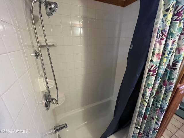 bathroom featuring shower / tub combo with curtain