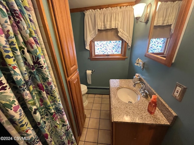 bathroom with vanity, tile patterned floors, a shower with curtain, toilet, and a baseboard radiator