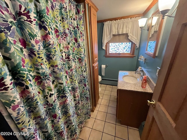 bathroom with tile patterned floors, vanity, a baseboard radiator, and toilet