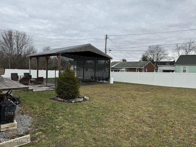 view of yard featuring a gazebo and a deck