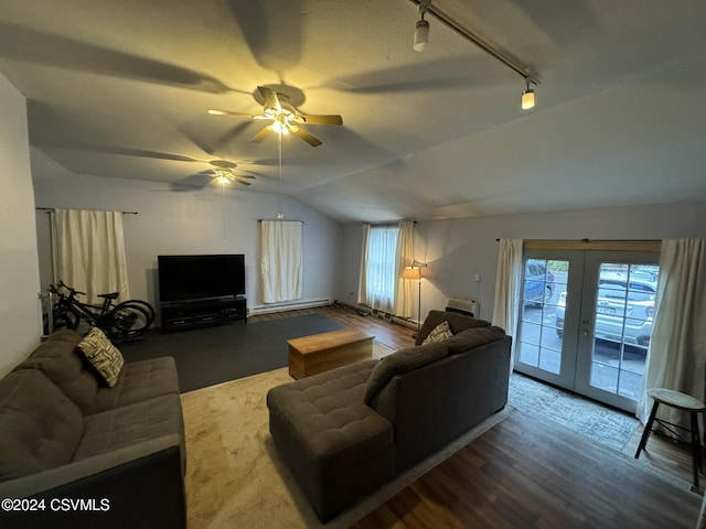 living room featuring french doors, track lighting, vaulted ceiling, ceiling fan, and dark wood-type flooring