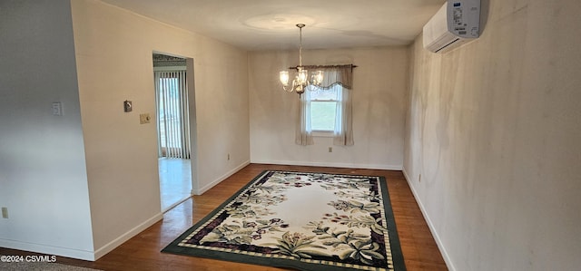 dining area with a notable chandelier, dark wood-type flooring, and a wall mounted AC