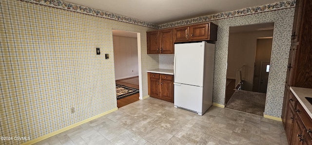 kitchen featuring white refrigerator