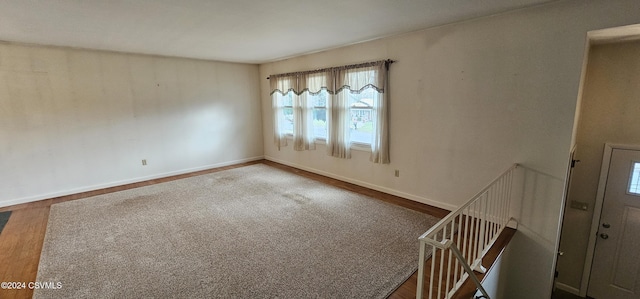 empty room featuring hardwood / wood-style flooring