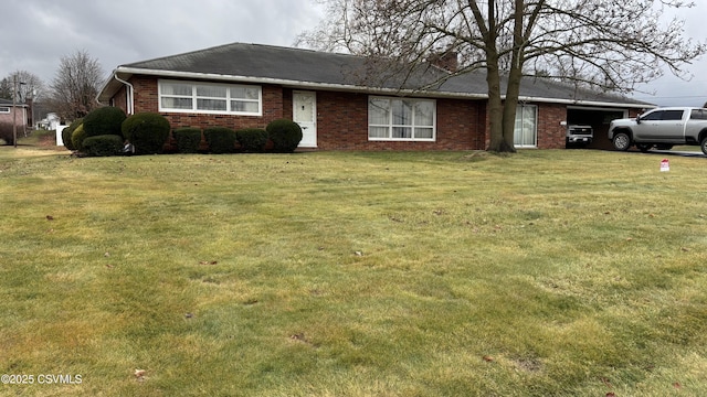 ranch-style home with a front lawn