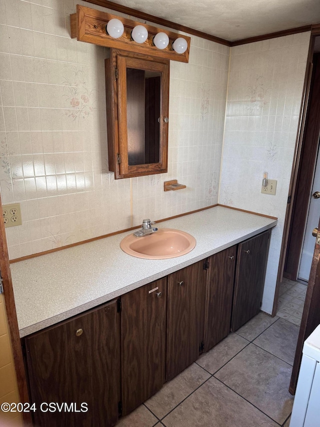 bathroom featuring tile patterned floors and vanity