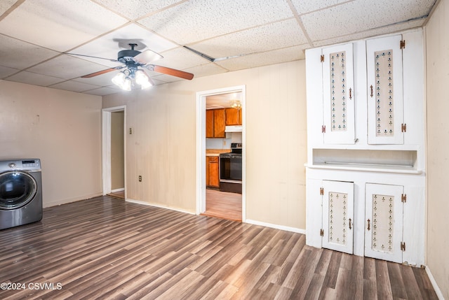 interior space with cabinets, washer / dryer, ceiling fan, and wood-type flooring