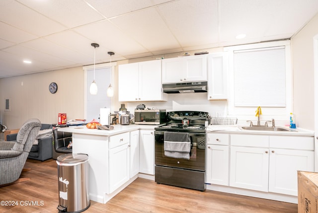 kitchen featuring pendant lighting, a drop ceiling, white cabinetry, and black range with electric cooktop