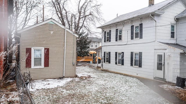 view of snow covered property