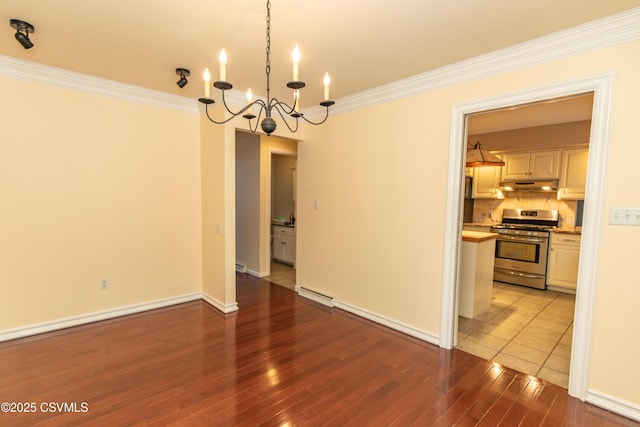 unfurnished dining area featuring light wood-type flooring, a baseboard heating unit, a notable chandelier, and ornamental molding