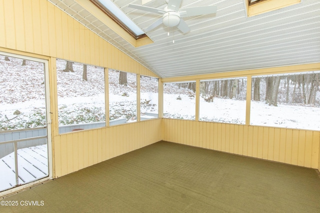 unfurnished sunroom with lofted ceiling and ceiling fan