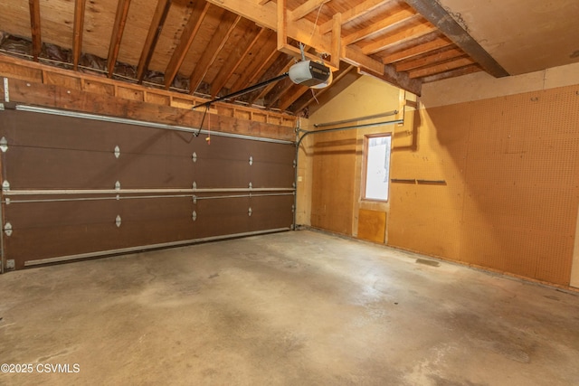 garage featuring a garage door opener