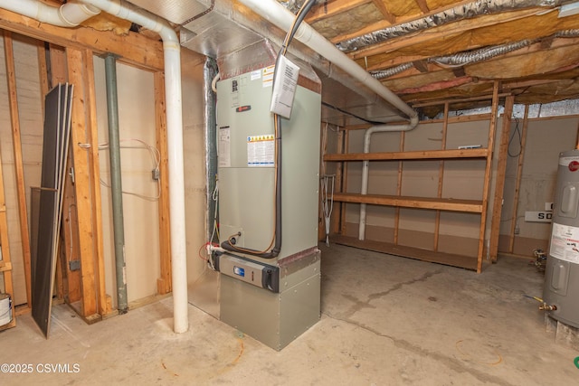 basement featuring electric water heater and heating unit