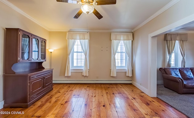 doorway to outside with baseboard heating, light hardwood / wood-style flooring, ceiling fan, and ornamental molding