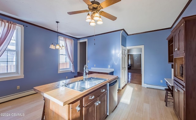 kitchen featuring dishwasher, sink, hanging light fixtures, a baseboard heating unit, and a center island with sink