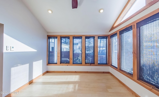 unfurnished sunroom with vaulted ceiling