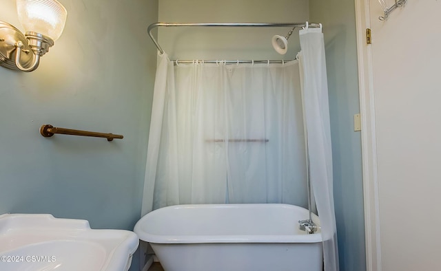 bathroom with a washtub